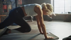 Beautiful and Young Girl Does Running Plank on Her Fitness Mat. Athletic Woman Does Mountain Climber Workout in Stylish Hardcore Gym - Powered by Shutterstock - Get 15% off with code: PIKWIZARD15