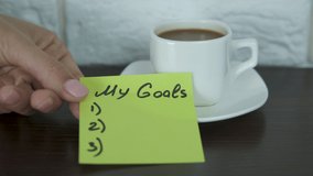 My goals. A cup of coffee with a note of my goals. - Powered by Shutterstock - Get 15% off with code: PIKWIZARD15