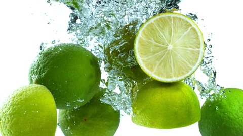 Super Slow Motion Shot of Falling Limes into Water at 1000fps.