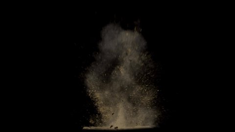 Dirt and dust particles explosion, Dirt Charge, sand particles detonates and floating over black background
