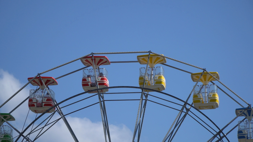 People are having fun in a ferris wheel