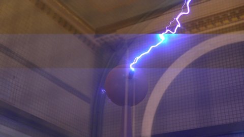This video shows an antique tesla coil discharging lightning and giant sparks