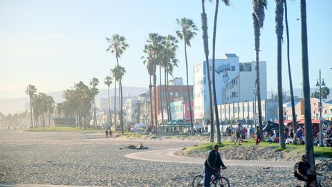Venice , CA / United States - 05 27 2019: Lazy Sunny Day on Venice Beach Boardwalk