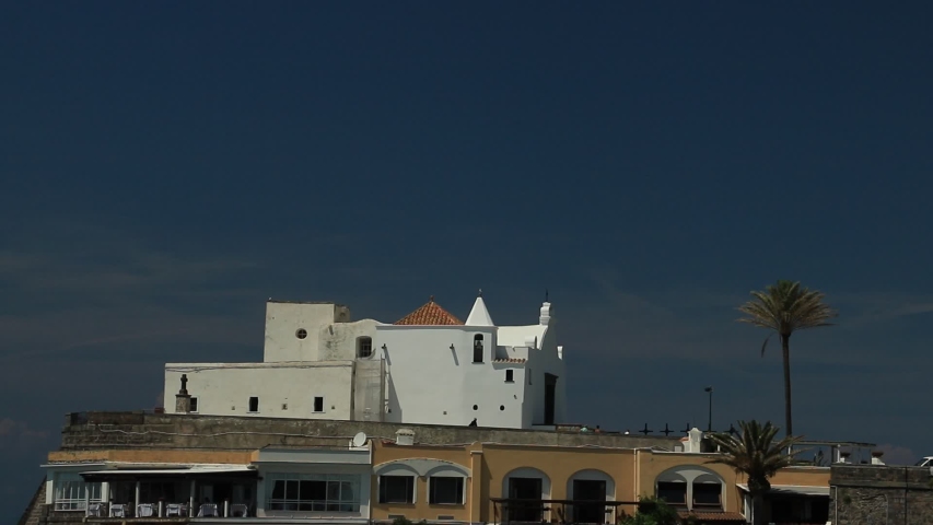 Forio, Ischia Island, Naples, Italy. Church of Soccorso in Forio on the island of Ischia near Naples. Example of typical Mediterranean architecture rises above the sea.