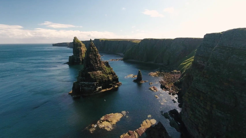 Aerial shot of Duncasby Stacks in Scotland, sunny day in 4K