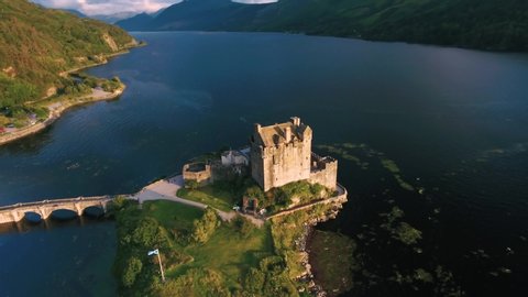 Famous Eilean Donan Castle in Scotland aerial shot from drone