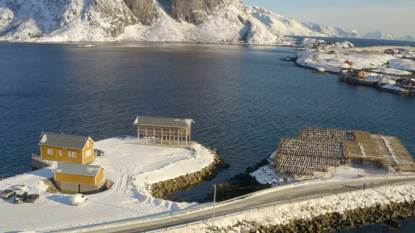 view of famous traditional multicolored wooden fishing houses rorbu on a sea shore at Lofoten archipelago, nothern Norway
