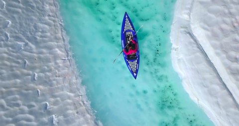 Aerial Ascending: Travelling on a Blue Kayak in the Cold of the Winter in Vancouver Canada