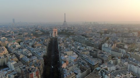Aerial: Paris City Towards Arc de Triomphe and Traffic Circle, France
