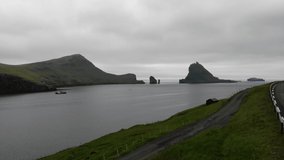 Aerial view of Tindholmur and Drangarnir islands in Faroe Islands, a territory of Denmark in the Atlantic Ocean.