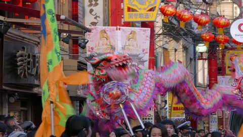 Chinatown , Yokohama / Japan - 02 24 2018:  - Dragon dance troupe perform during the Chinese New Year Parade 2018 in Yokohama's Chinatown.