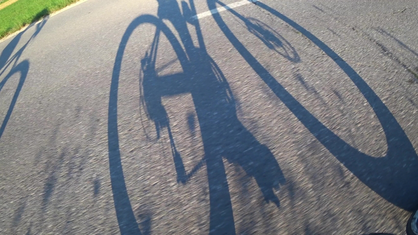 shadows bike riders dawn Stock Footage Video (100% Royalty-free) 1035432029...