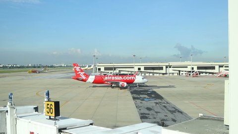 DON MUEANG, THAILAND - JULY20, 2019: Thai Air Asia plane running on the parking in Don Mueang international airport, Bangkok, Thailand.