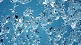 Slow Motion Shot of Water Splash. Macro water drops Professional video of blue  water bubbles 
