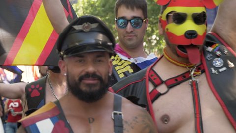 Madrid, Spain. CIRCA July 2019: Human Pups in a Gay Pride demonstration in Madrid. People dressed like dogs. 