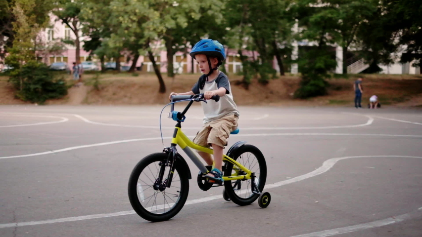 how to help child ride bike