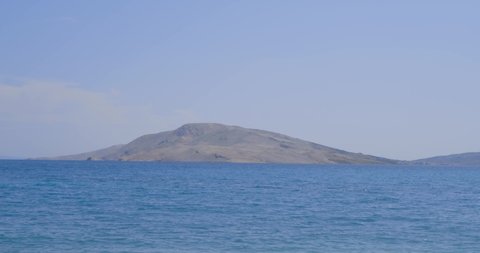 View from Rucica beach on the island of Pag towards rocky coast on the other side.
