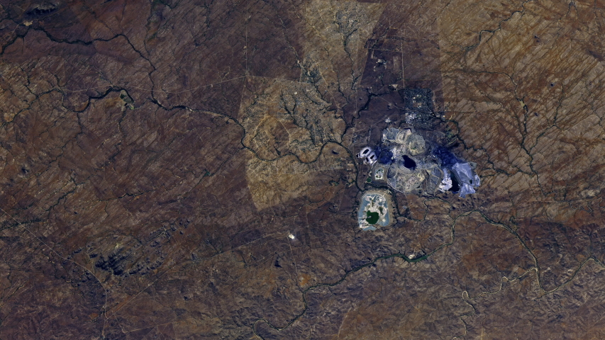 Copper open pit mine aerial satelite view sunrise animation. Contains public domain image by Nasa