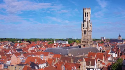 BRUGES, BELGIUM - CIRCA 2018 - Good rising aerial reveal the skyline of Bruges Belgium includes Belfort Van Brugge and other downtown landmarks.