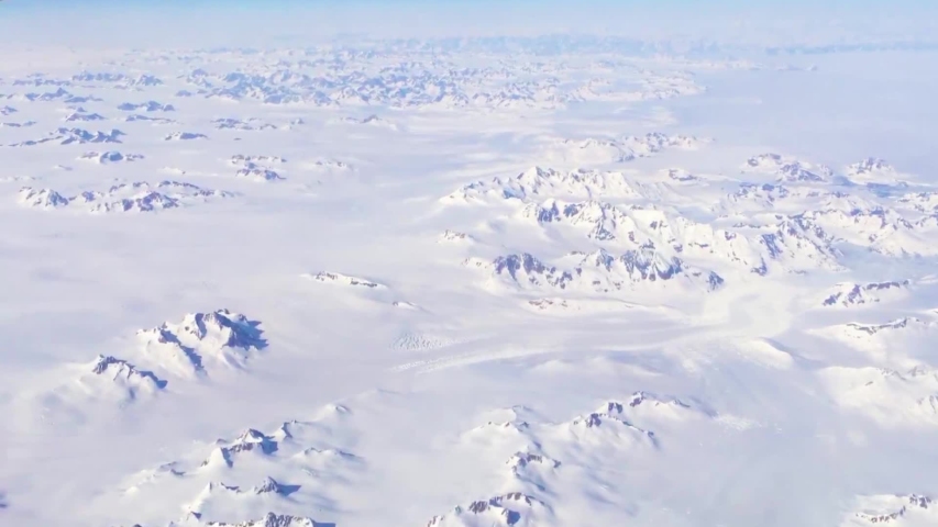 GREENLAND - CIRCA 2018 - Good aerial over Greenland ice sheet and heavy snowpack. Royalty-Free Stock Footage #1035466142