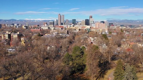 DENVER, COLORADO - CIRCA 2018 - Good aerial of downtown Denver Colorado skyline and business district from City Park.