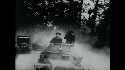 CIRCA 1940 - The Panzer Division advances across a French battlefield.