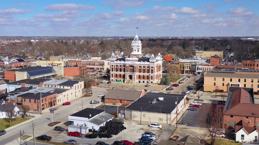 FRANKLIN, INDIANA - CIRCA 2018 - Aerial over Franklin, Indiana, a quaint all American Midwest town with pretty central courthouse.