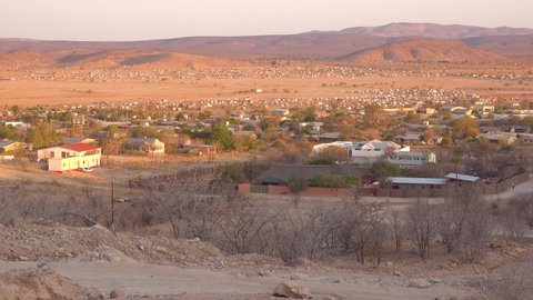 NAMIBIA - CIRCA 2018 - Establishing shot of the Himba tribal market town of Opuwo in northern Namibia.