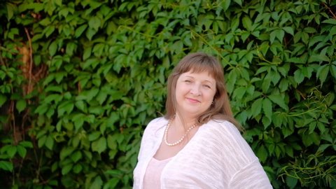 6 People in nature chubby mature woman Stock Video Footage - 4K and HD