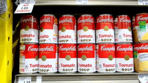 Woodland, CA/USA 8/15/2019 Tin Cans of Campbell's brand assorted cremes and soups for sale at a supermarket aisle
