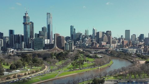 An aerial shot of Melbourne City, along the Yarra River past alexandra gardens towards CBD, Melbourne Australia 