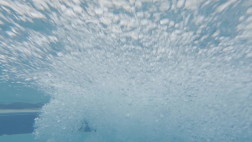 Underwater view of air bubbles comming from a jacuzzi jet | Shutterstock HD Video #1035507587