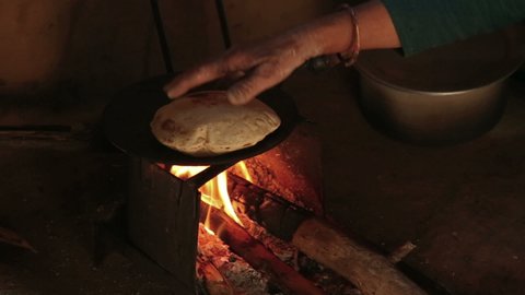 close up of the rural preparation of the Indian chapati
