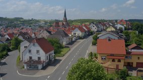 Aerial view of the village Höpfingen in Germany. Ascending beside the town.