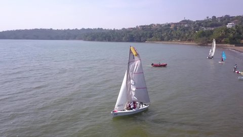 Boat sailing competition at the beach, Goa, India.