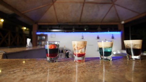 Four types of alcohol shots ready to drink.