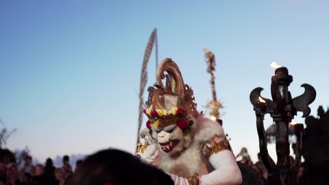 Actor in costum of white beast performing Kecak dance which storyline is taken from Ramayana Hindu epic. Uluwatu temple, Bali, Indonesia