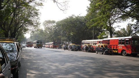 Mumbai, India - December 25, 2017: Buses in the street of Mumbai.