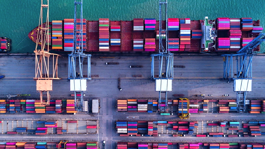 4K Timelapse of modern industrial port with containers from top view or aerial view. It is an import and export cargo port where is a part of shipping dock.Singapore