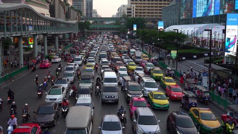 Bangkok, Thailand - July 23, 2019: A heavy traffic in the evening at Rama I Rd around Centralworld and Big C in Pathum Wan, Bangkok, Thailand. This area is crowded during office hour and holiday time.