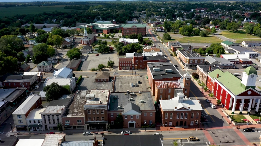 Aerial dolly left over Charles Town, WV showing American University.