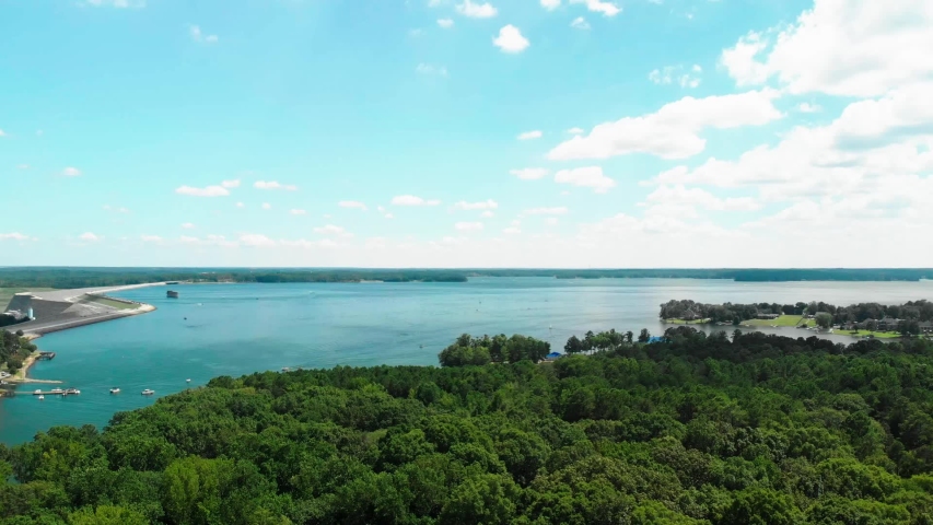 Aerial drone footage of the dam and the lake in Lake Murray, South Carolina.