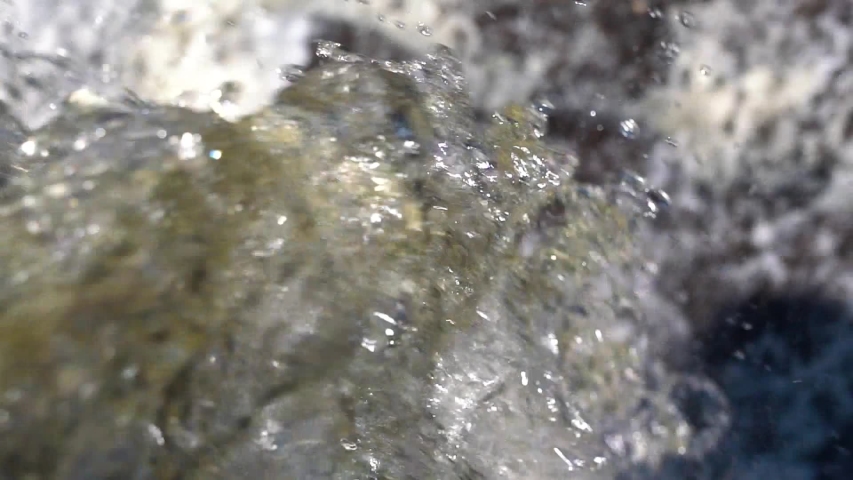 Extreme close up of water plunging down the Gooseberry Falls in summer.