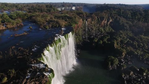Puerto Iguazú, Misiones / Argentina - 08/04/2019: Aerial view of waterfalls from Iguazu Falls, Iguazu National Park, one of the seven natural wonders of the world