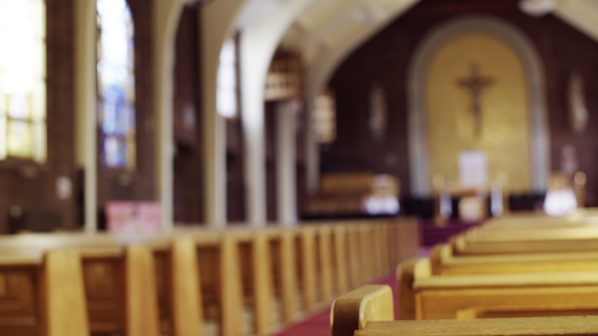 Sliding shot of Pews in Church with a shallow DOF | Shutterstock HD Video #1035654230