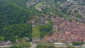 Aerial view of the city Wertheim am Main in Germany. Wide view with pan to the right beside the castle and old town.