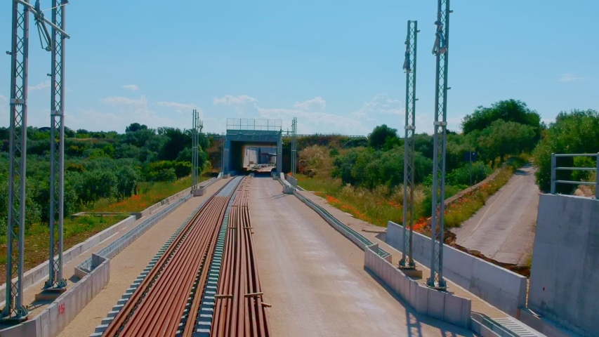 Underpass and tunnel for the construction of a new railway line. Detail of sewage and metal lattice ducts for the electrification of the railway line.