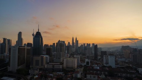 Time Lapse Of Kuala Lumpur During Sunrise Overlooking City Skyline With Rolling Cloud at Federal Territory,Malaysia.4K.Prores.