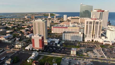 Atlantic City , New Jersey / United States - 06 03 2019: Gambling and leisure seaside resort in Atlantic City, New Jersey, aerial view of beachfront boardwalk with hotels and casinos
