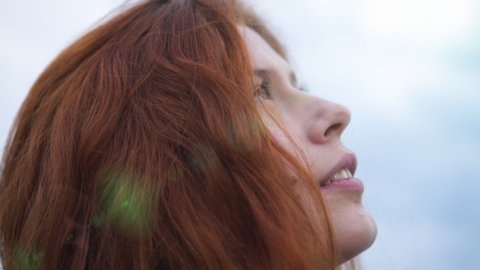 Redhead Young Woman Looking Up To Sunset Sky With Hope Pray Prayer Sun Flare